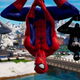 Three versions of Spider-Man hanging upside down as seen in the leaked trailer.